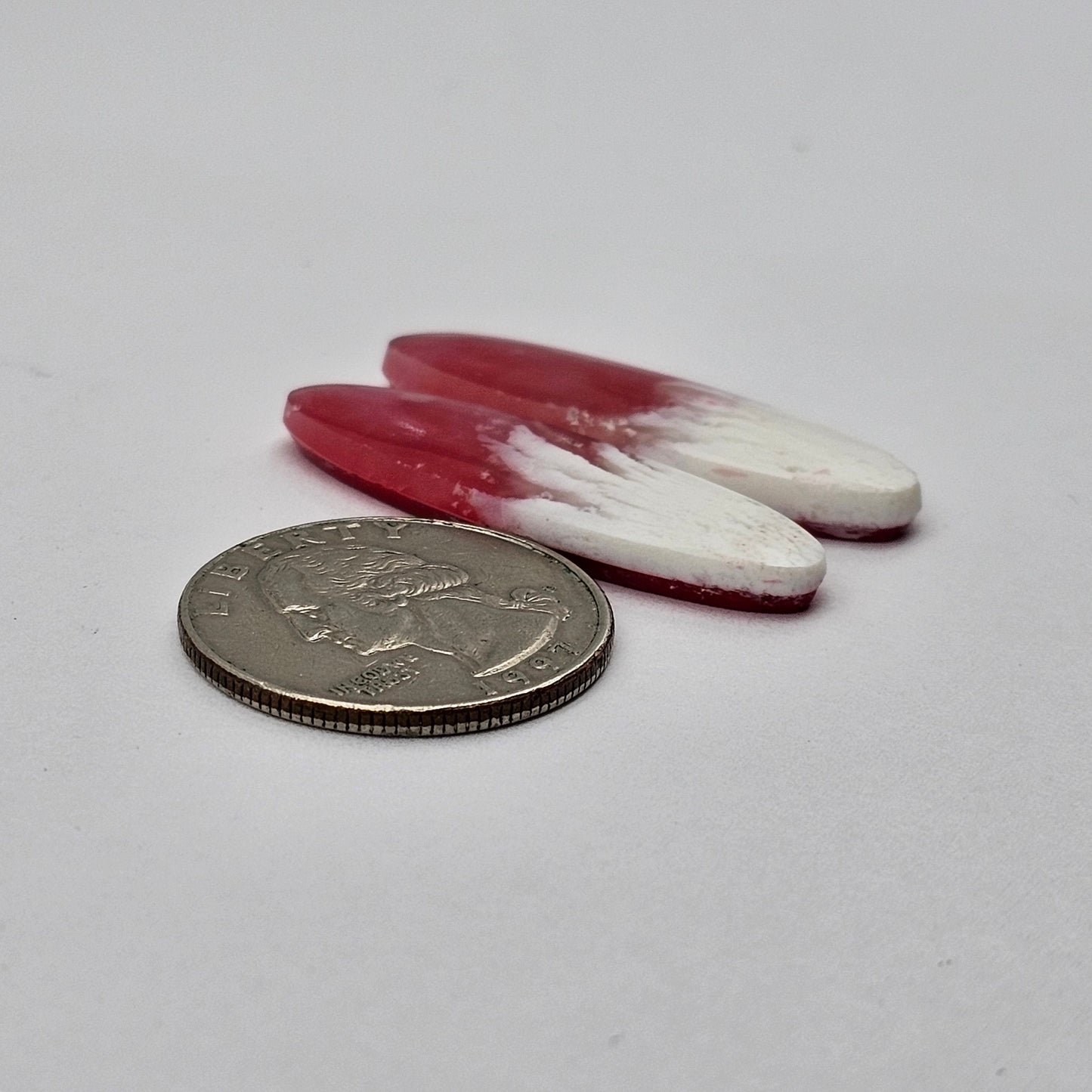 Pink skystone resin cabochon pair