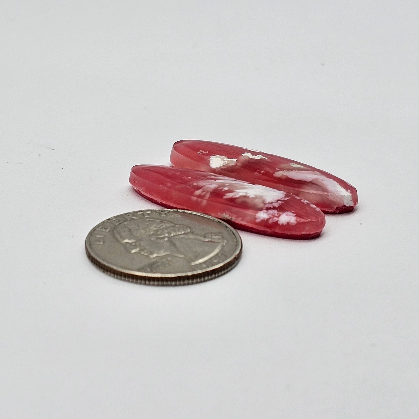 Pink skystone resin cabochon pair