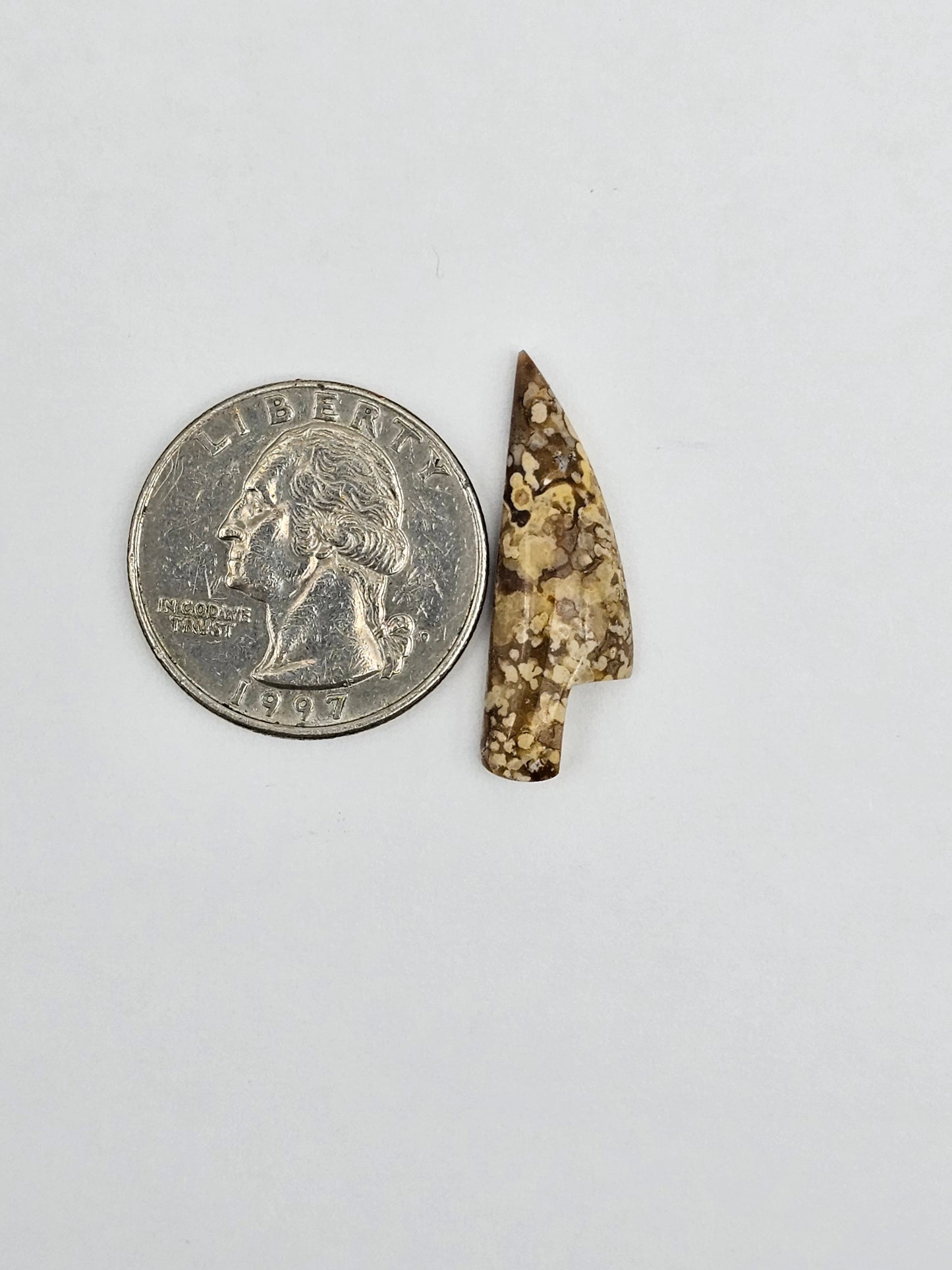 Dotted agate knife cabochon