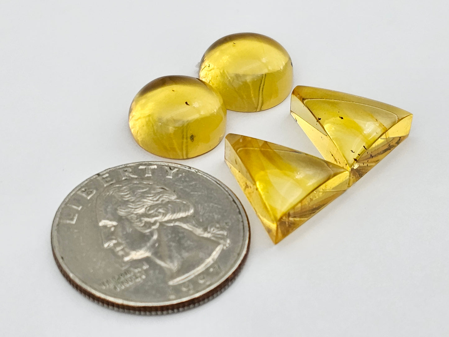 Amber authentic cabochon pair lot