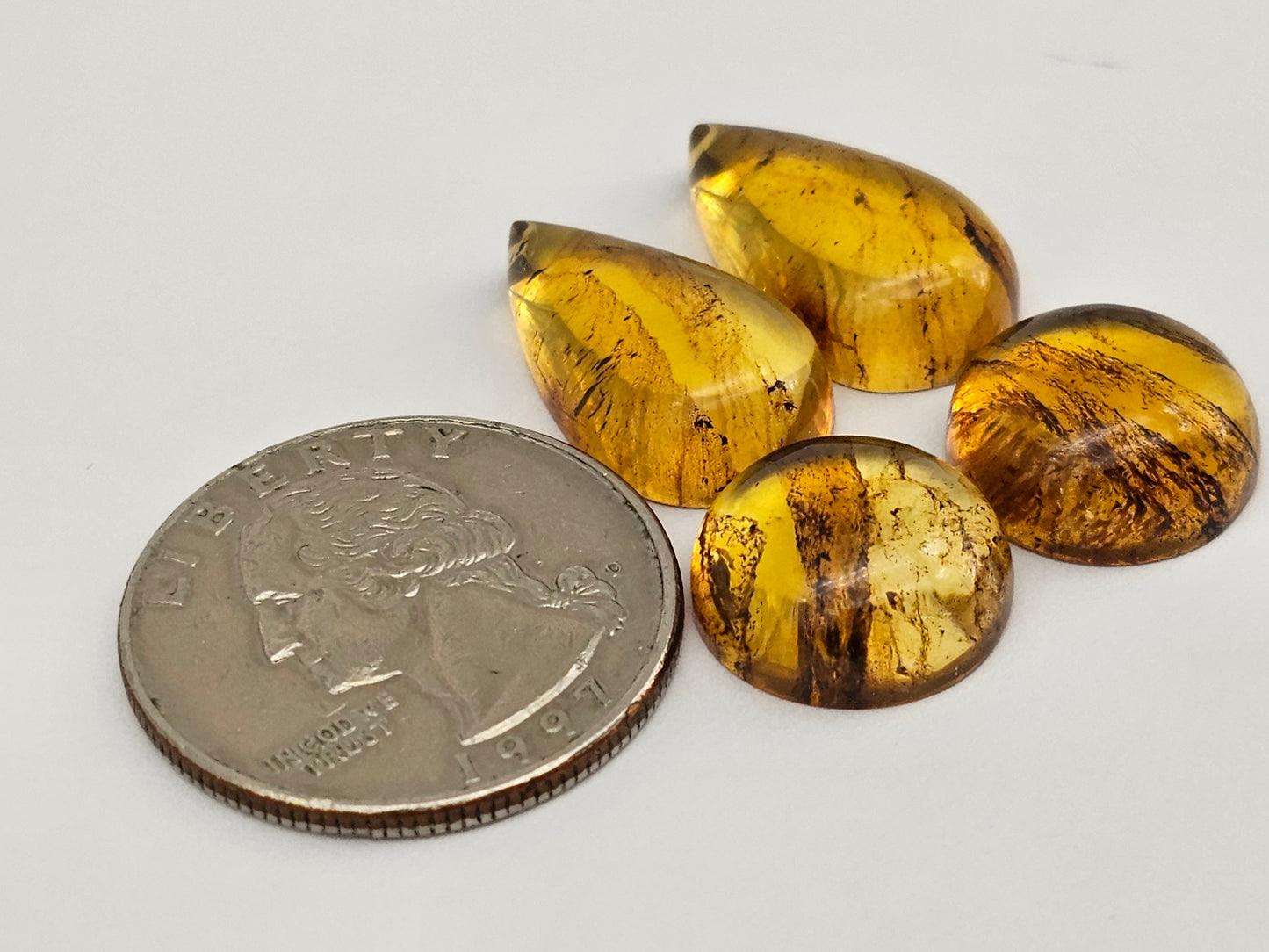 Amber authentic cabochon pair lot