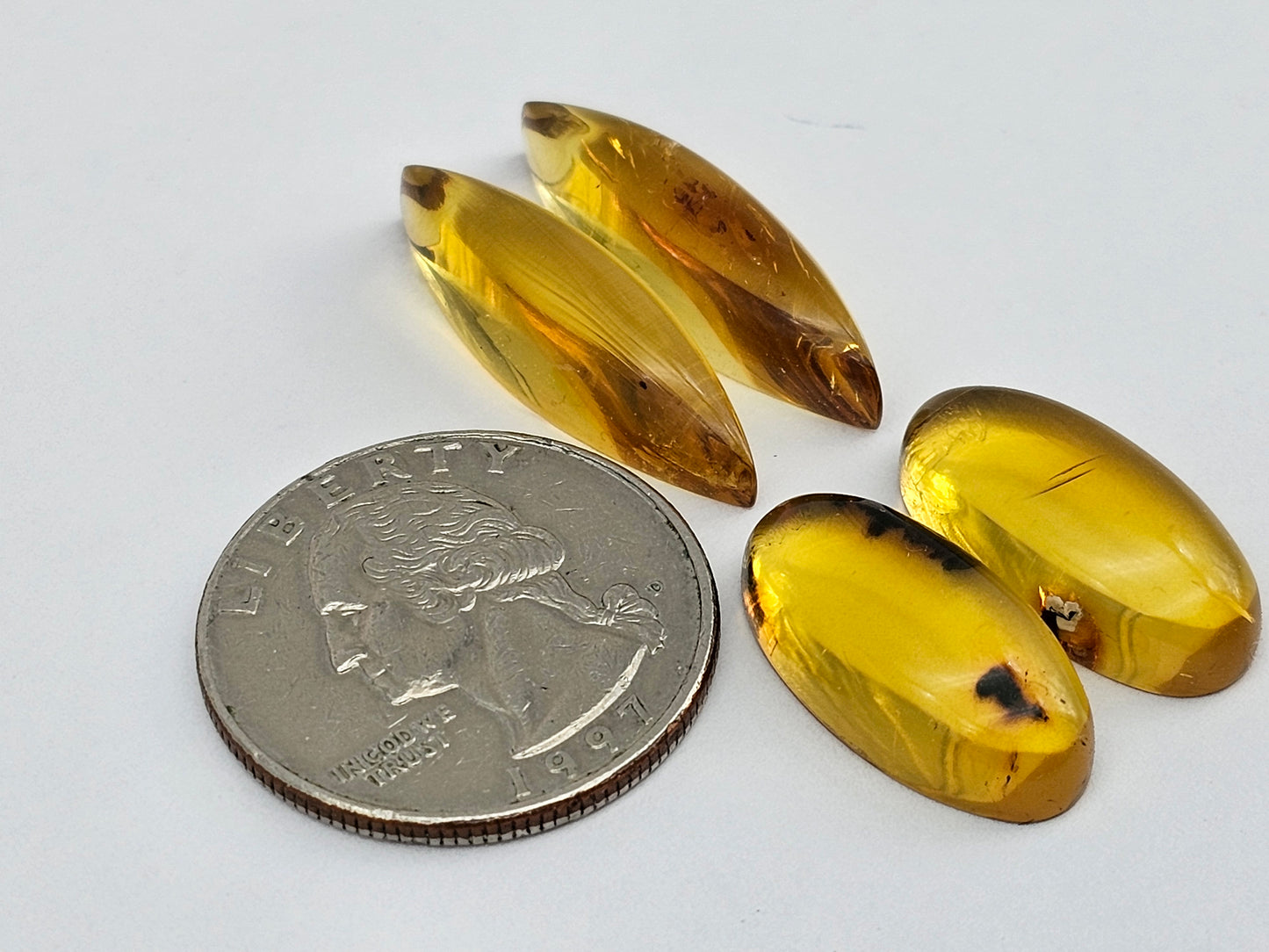 Amber authentic cabochon pair lot