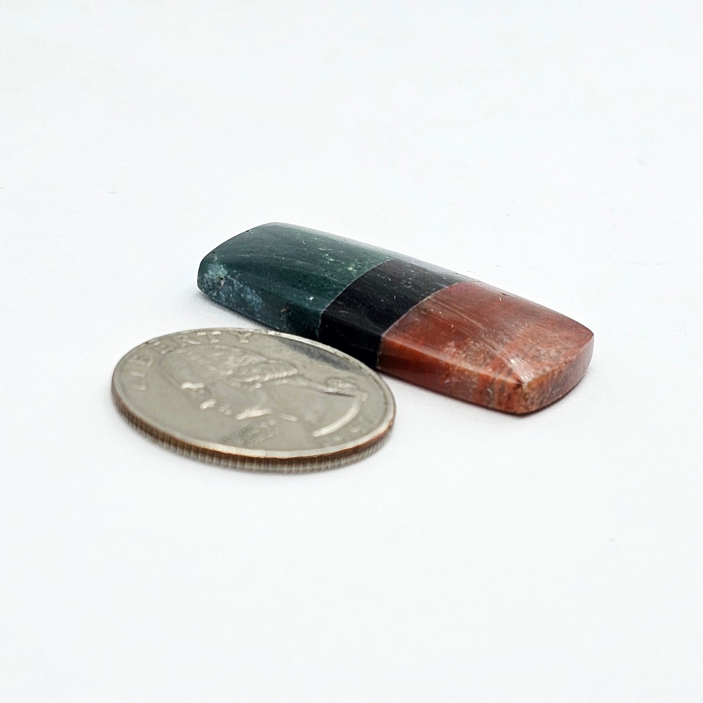 Intarsia inlay cabochon with agate and obsidian