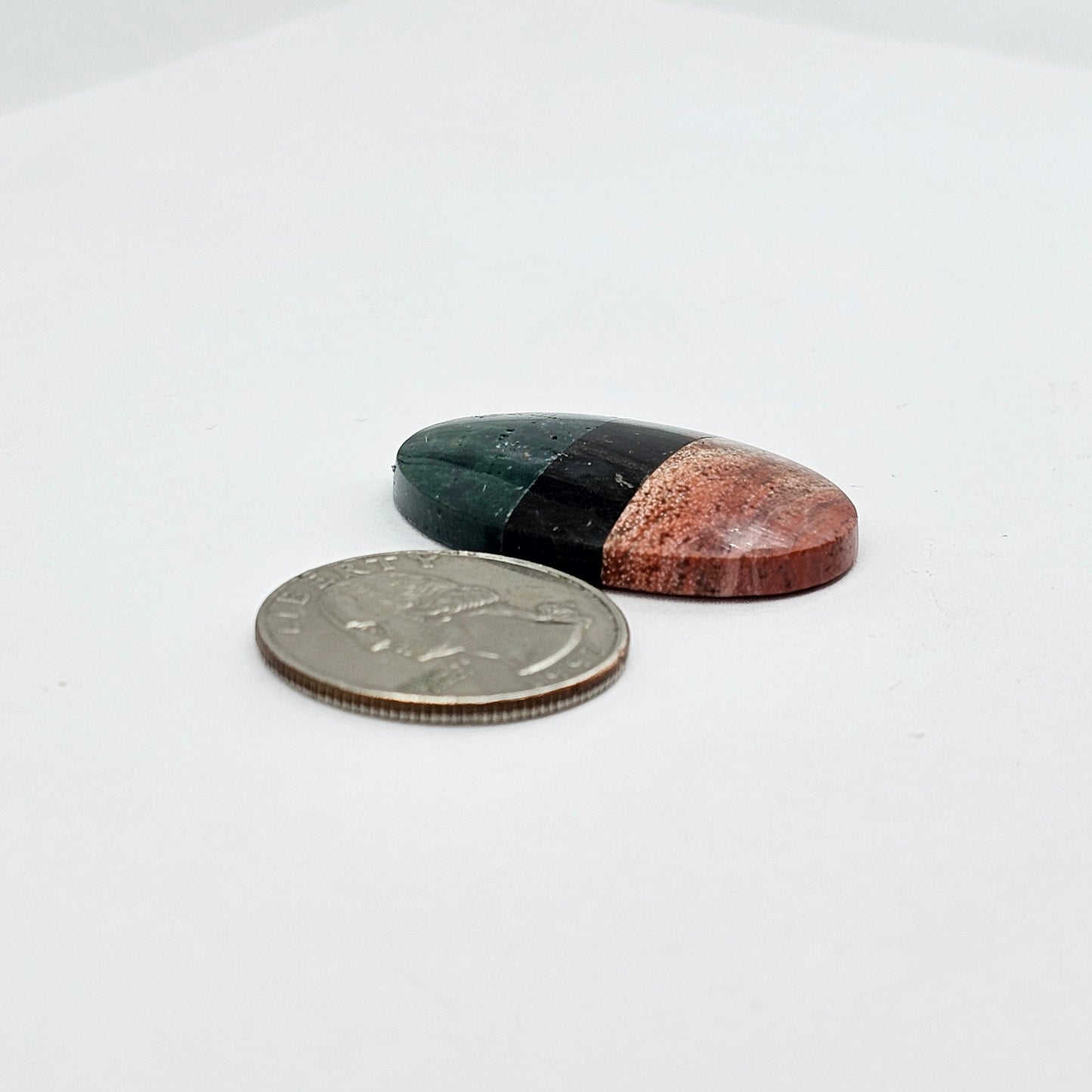 Intarsia inlay cabochon with agate and obsidian