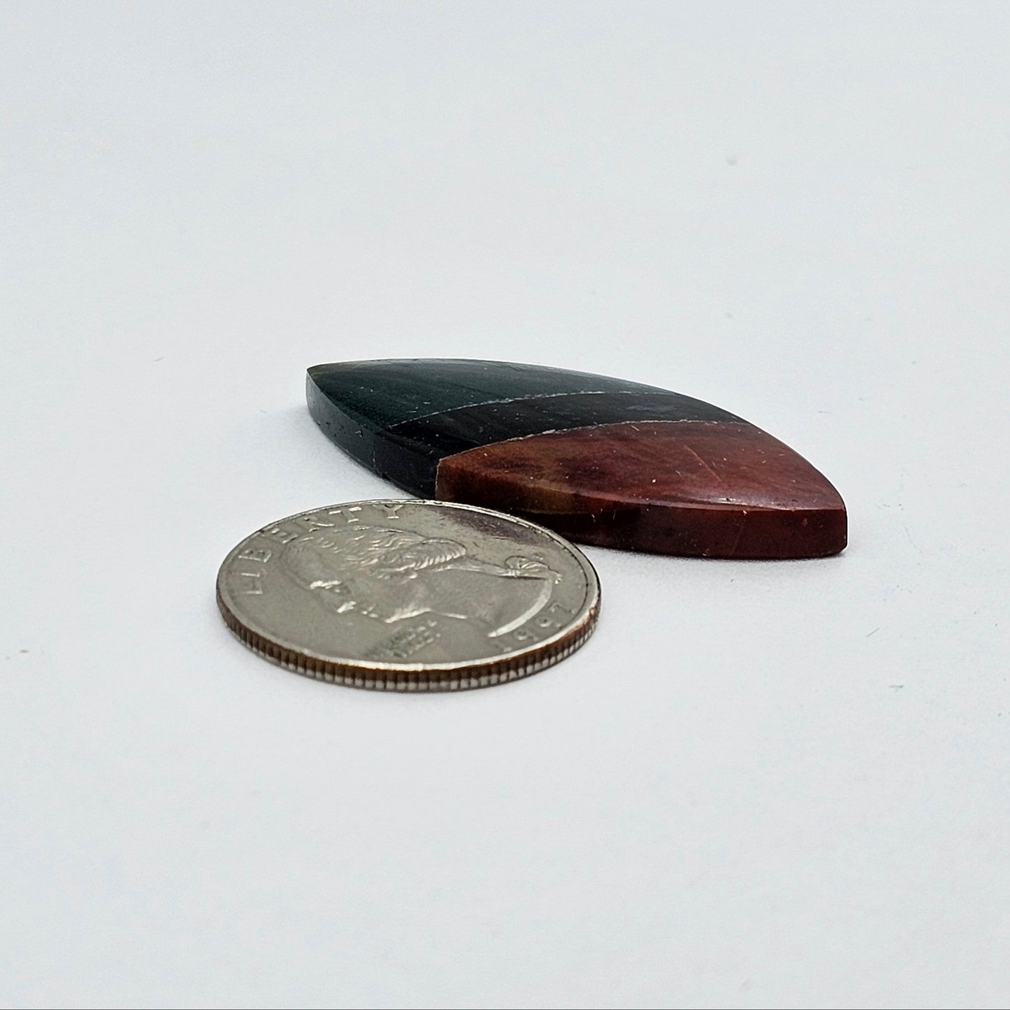 Intarsia inlay cabochon with agate and obsidian