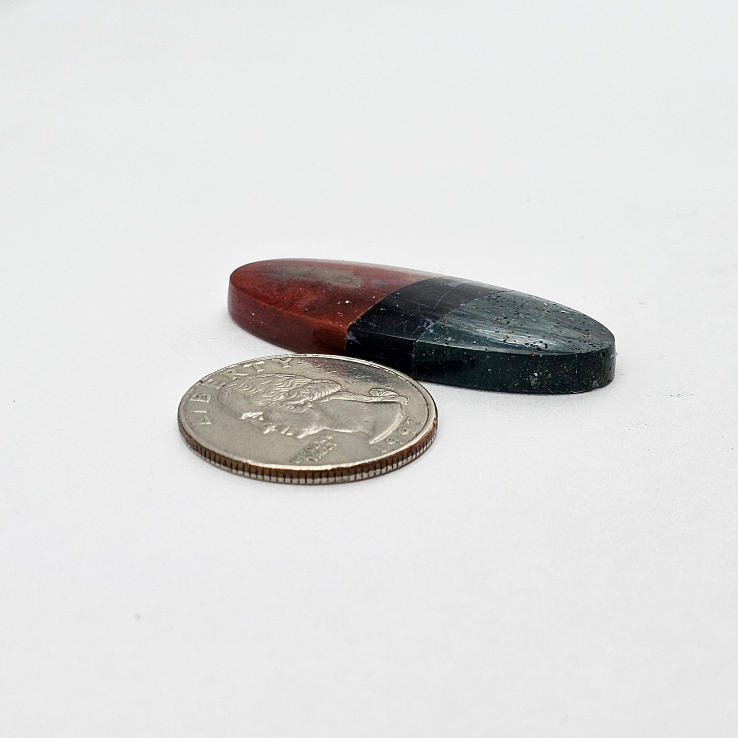 Intarsia inlay cabochon with agate and obsidian