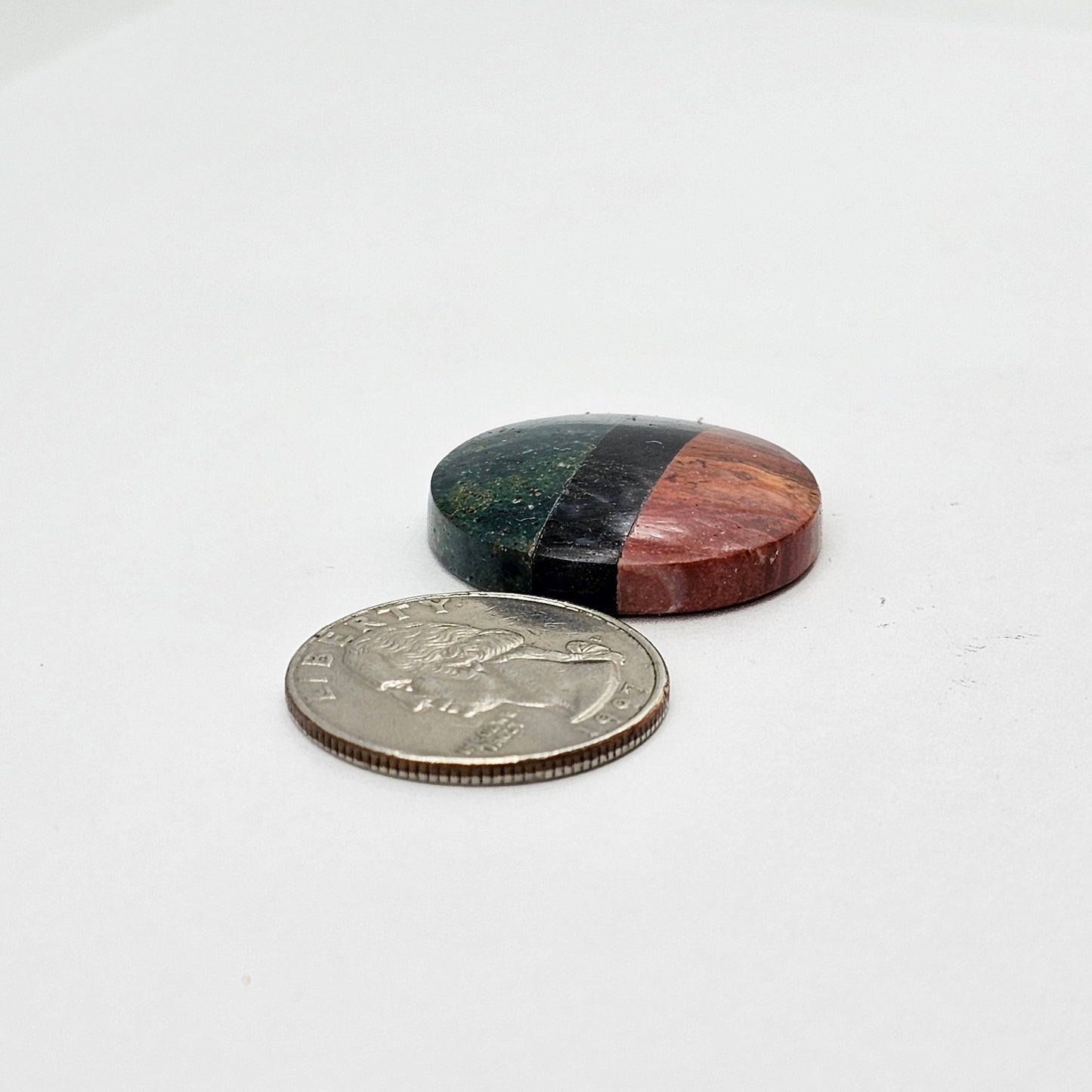 Intarsia inlay cabochon with agate and obsidian