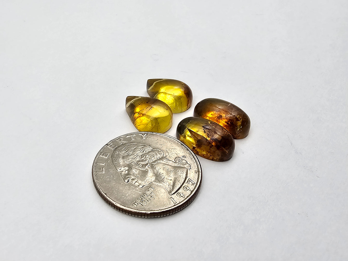 Amber authentic cabochon pair lot