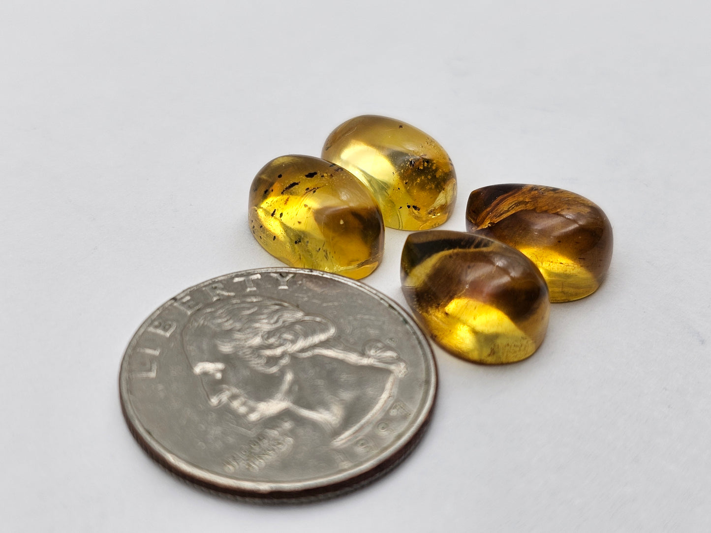 Amber authentic cabochon pair lot