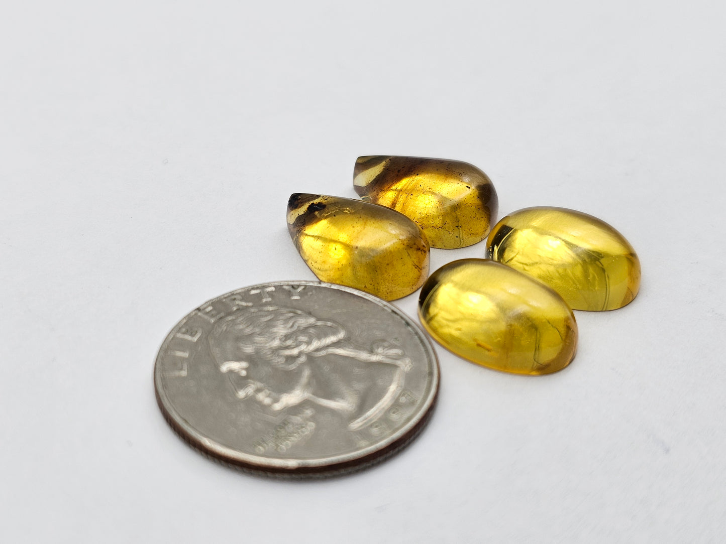 Amber authentic cabochon pair lot