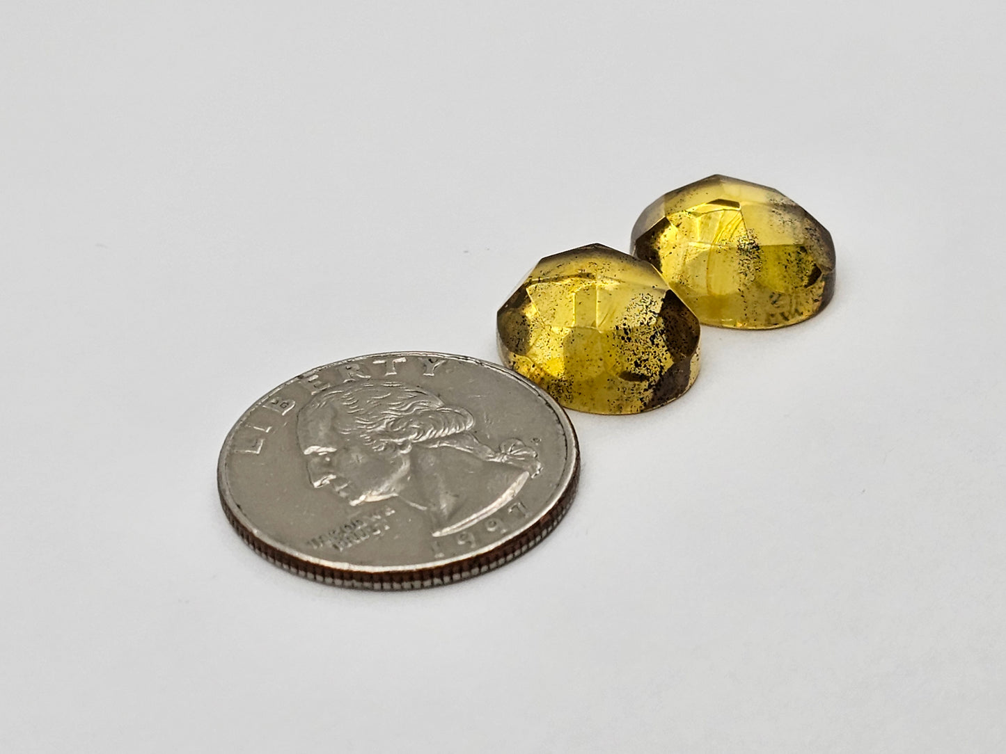 Amber faceted oval pair