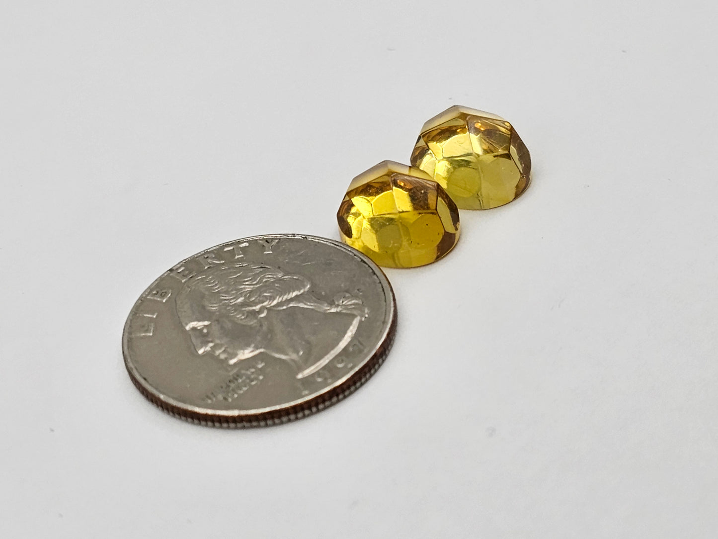 Amber faceted oval pair