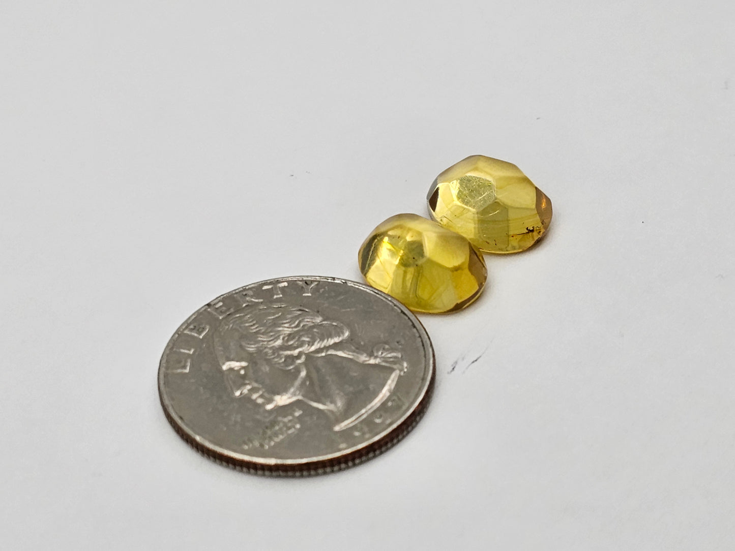 Amber faceted oval pair