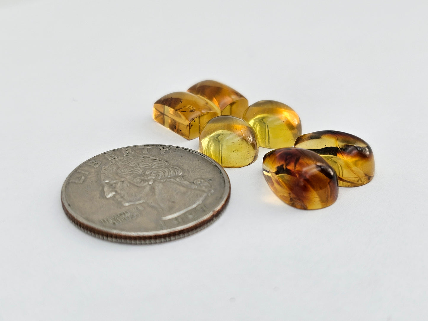 Amber authentic cabochon pair lot
