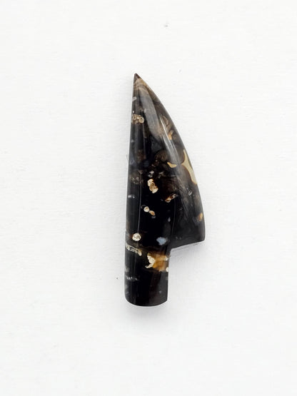 Petrified palm root knife cabochon