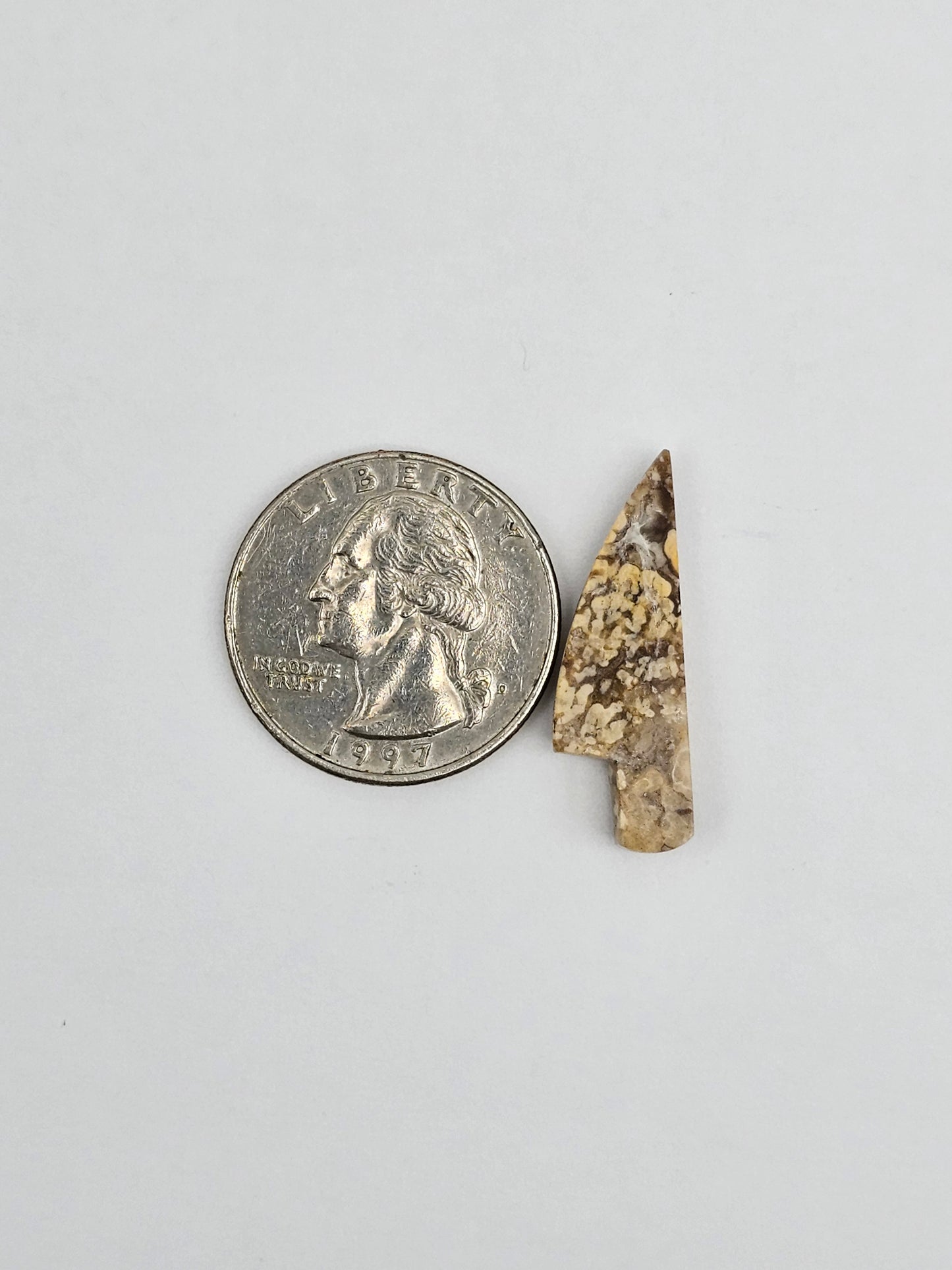 Dotted agate knife cabochon