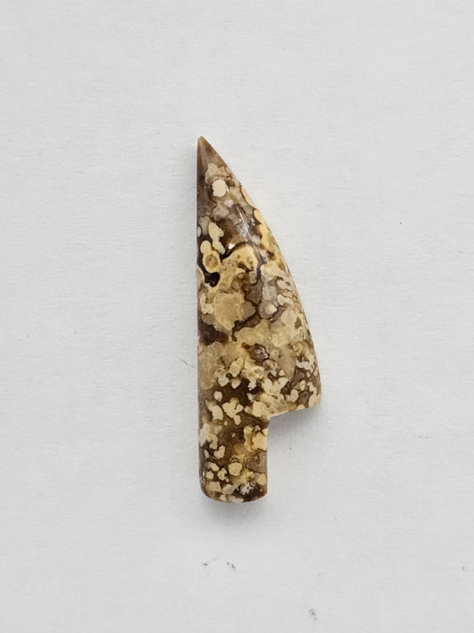 Dotted agate knife cabochon