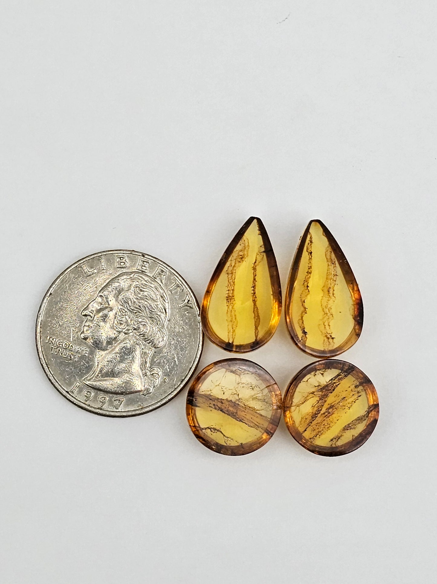 Amber authentic cabochon pair lot