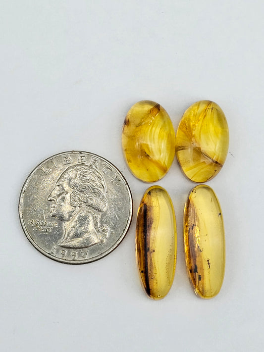 Amber authentic cabochon pair lot
