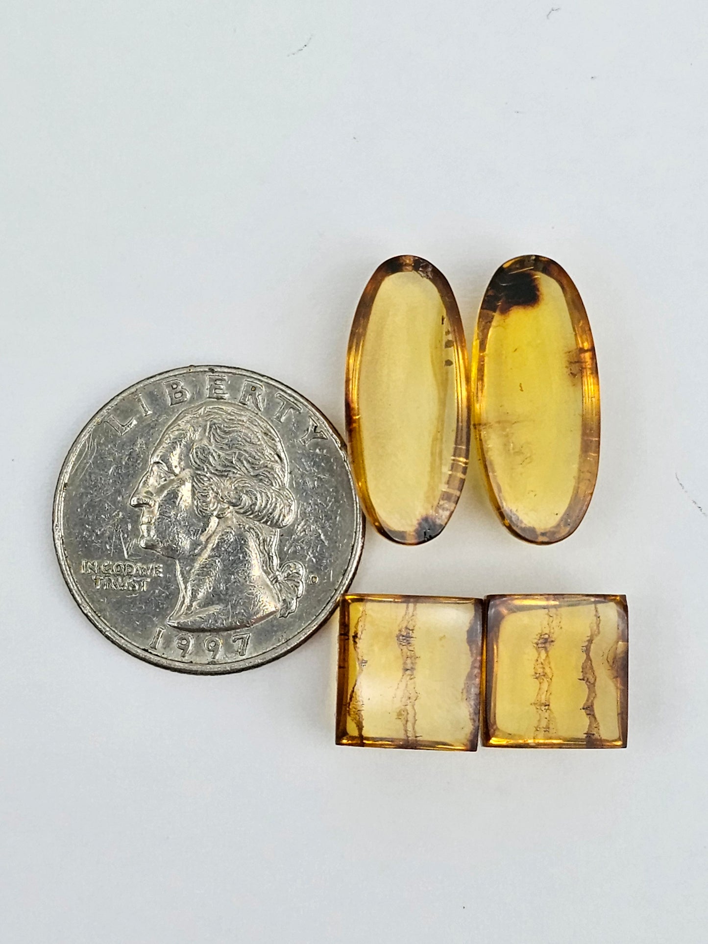 Amber authentic cabochon pair lot