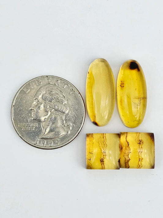 Amber authentic cabochon pair lot
