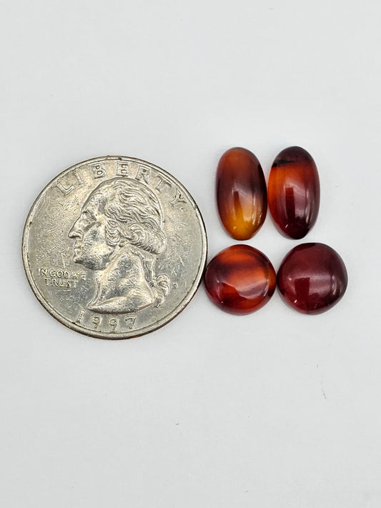 Amber authentic cabochon pair lot