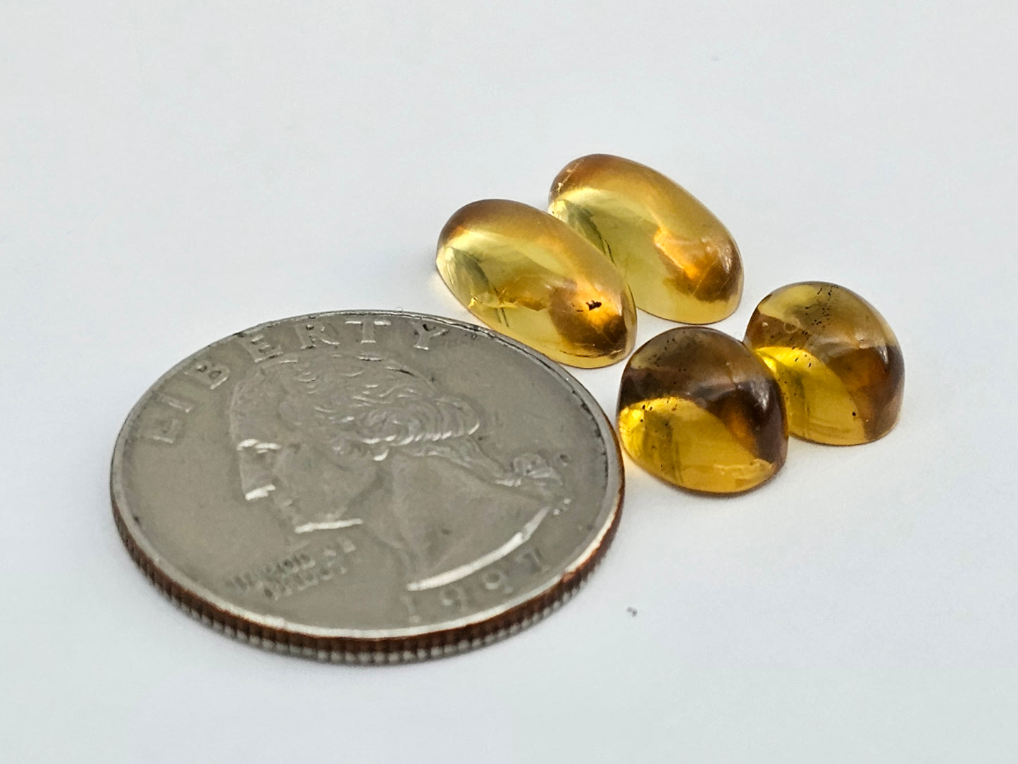 Amber authentic cabochon pair lot