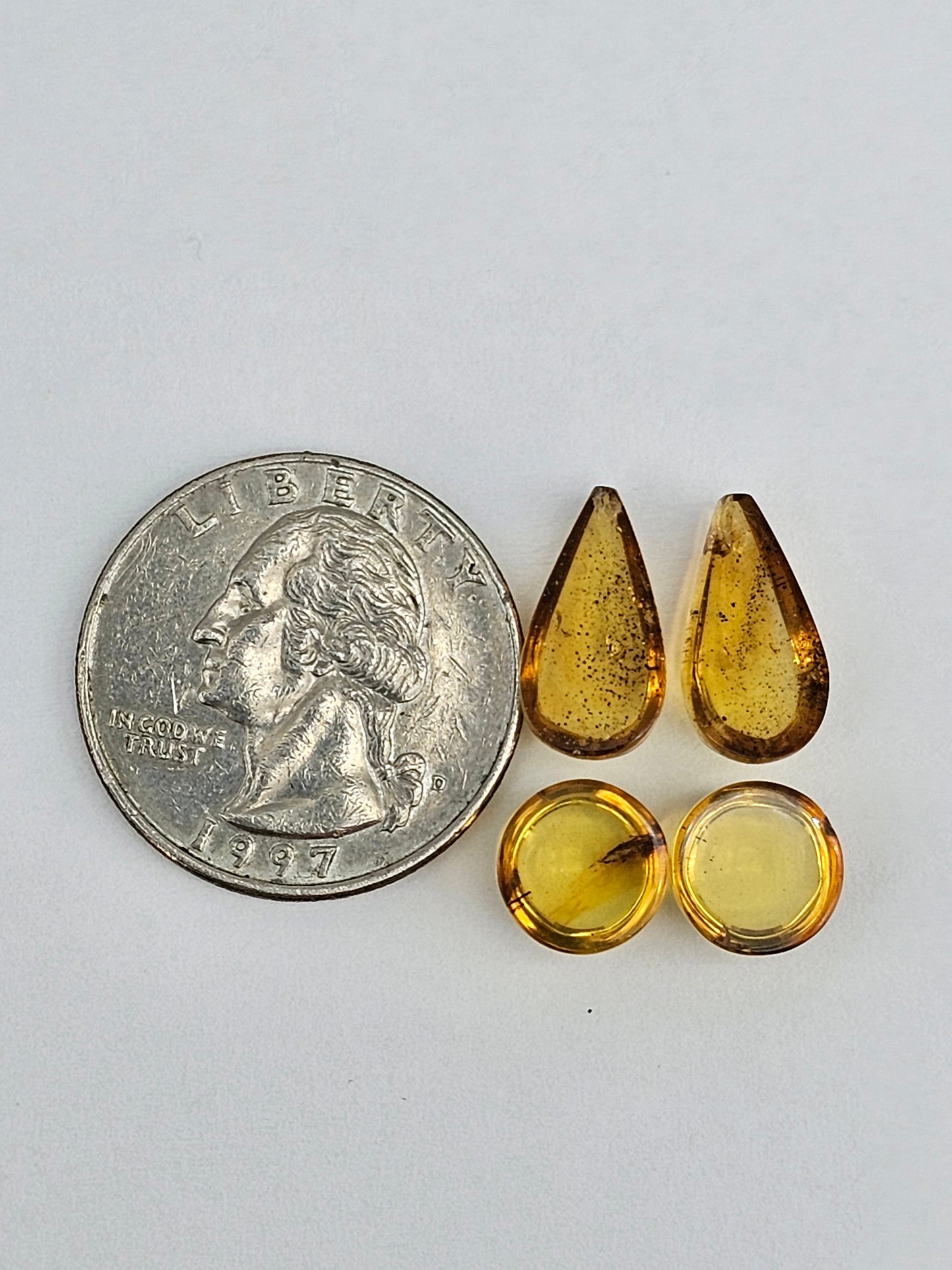 Amber authentic cabochon pair lot