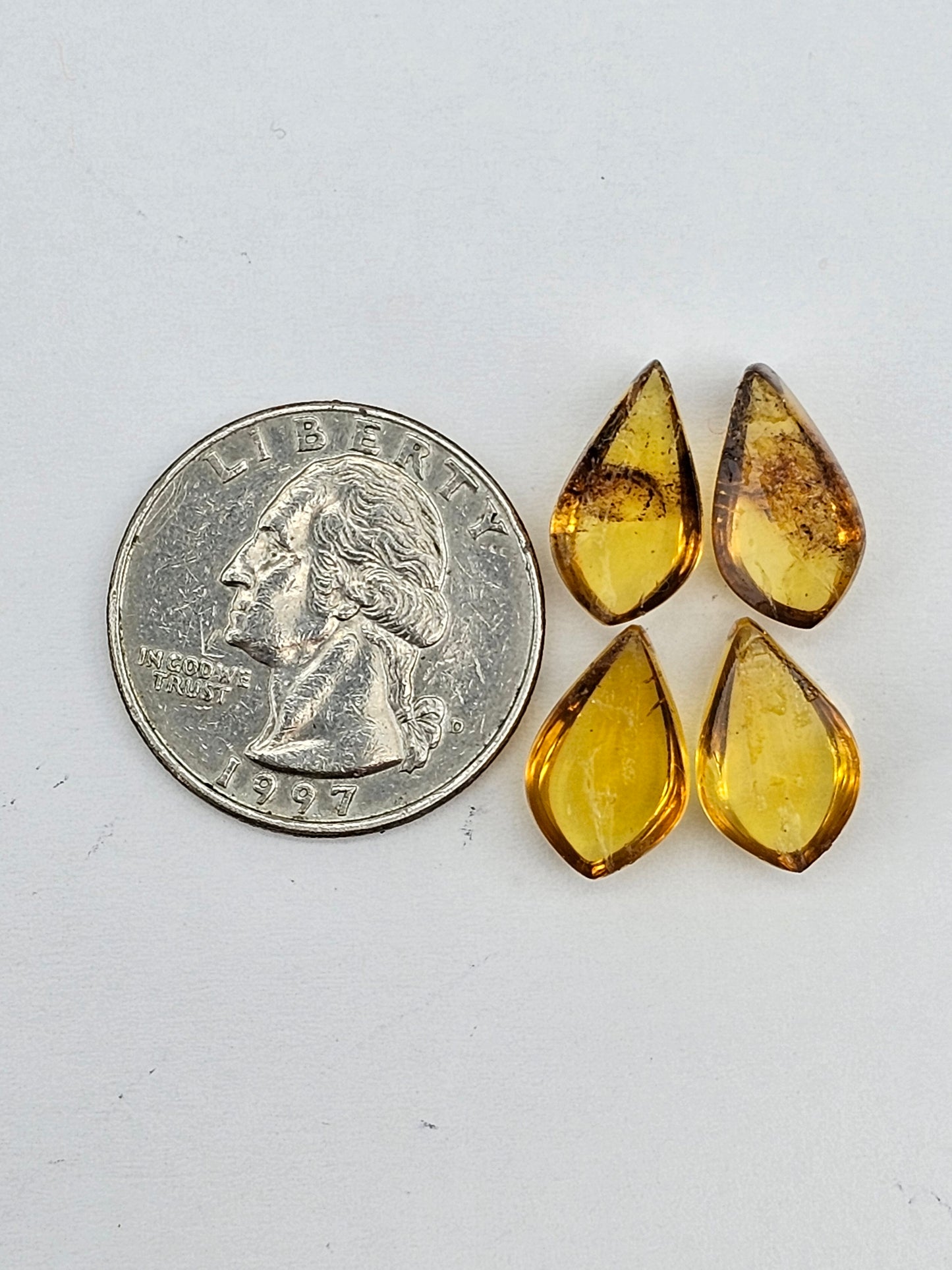 Amber authentic cabochon pair lot
