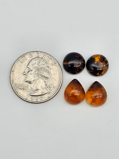 Amber authentic cabochon pair lot
