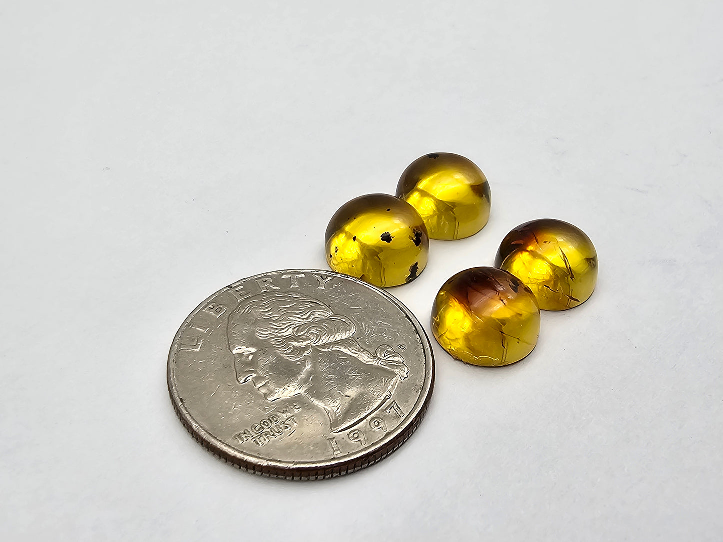 Amber authentic cabochon pair lot
