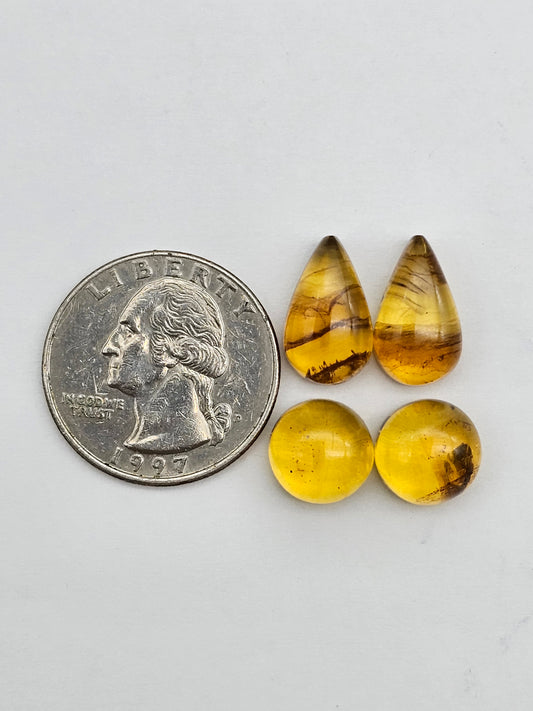 Amber authentic cabochon pair lot