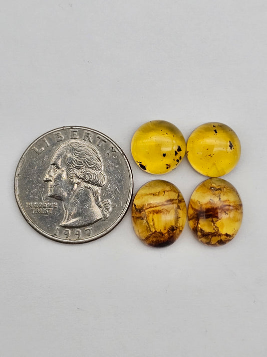 Amber authentic cabochon pair lot