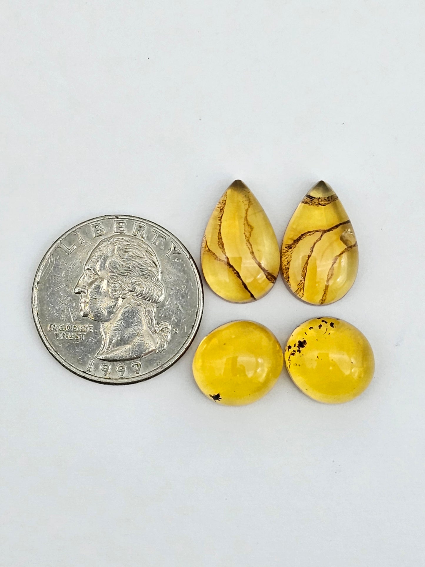 Amber authentic cabochon pair lot