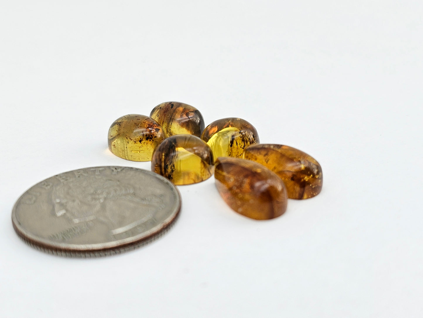 Amber authentic cabochon pair lot
