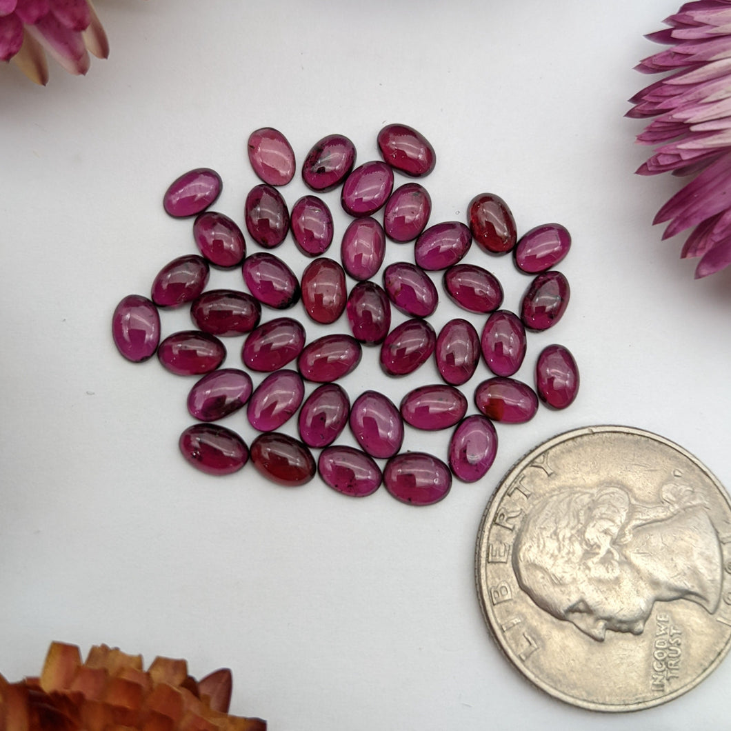 Rhodolite garnet oval lots (6 mm x 4 mm)